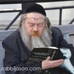 Rabbi reading 50 shades of Grey